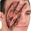 Shredded Scar Appliance 1 Shredded Scar Appliance -Spirit Halloween Shop 01297696 a