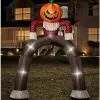 12 Ft Light-Up Pumpkin Scarecrow Inflatable Archway 2 12 Ft Light-Up Pumpkin Scarecrow Inflatable Archway -Spirit Halloween Shop 01602218 a